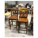 Three wood barstools scrapes and scratches