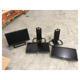 Three HP monitors with chords Three HP monitors with chords