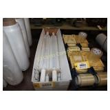 Rolls of plastic shrink wrap