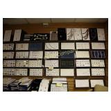 Lot:  Assorted jewelry displayed on wall