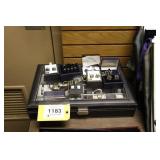 Lot:  Assorted jewelry displayed in a case