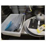 Lot of pizza pans, sandwich presses, covers