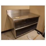 Stainless steel table with shelves