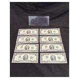 EIGHT CRISP TWO DOLLAR BILLS