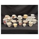 ASSORTED TEA CUPS WITH SAUCERS