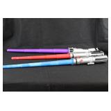 LOT OF THREE STAR WARS LIGHT SABERS PLASTIC LOT OF THREE STAR WARS LIGHT SABERS PLASTIC