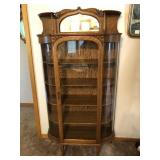 Oak curio cabinetMeasures 70 inches tall 36