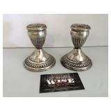Weighted sterling silver candlesticks
