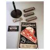 Harmonicas and music book from Mason City