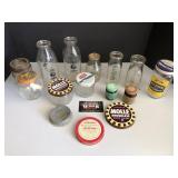 Vintage cream bottles and glass household items