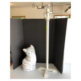 Cat doorstop in child