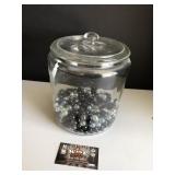 Glass cookie jar with glass marbles