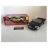 1/18 scale Ford Thunderbird and 1/24 scale bill