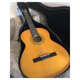 Lotus Amigo guitar (one broken string)