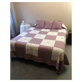 Queen size bed with bedding