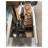 Kitchen utensils and plastic tray