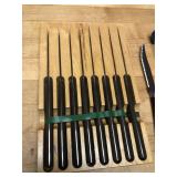 5 CUTCO steak knives