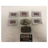 White farm equipment belt buckles