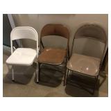 Three mismatch folding chairs