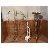 Brass colored plant stands and shower handle