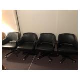 4 Black vinyl swivel chairs