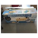 Rain train traveling tractor sprinkler