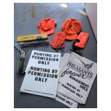 Hunting hats, scope, signs