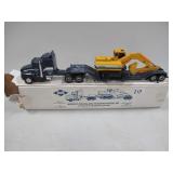 Midwest Kenworth Lowboy w/JD Excavator