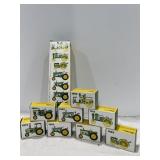Miniature John Deere tractors, eight