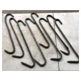Machine shed wall hooks