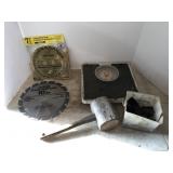 Saw blades, wooden mallet, scale