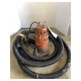 Super Flow sump pump, hose and drain snake