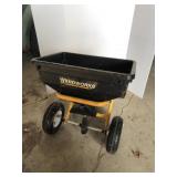 Pull behind lawn broadcast spreader