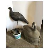 6- plastic geese and 1 turkey decoy