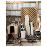 Dog house, lattice, ladder, hose reel, and