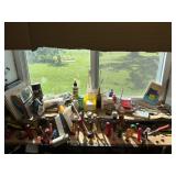 Screwdrivers and contents in window ledge