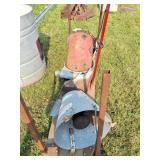 Grain bin spreaders and scale