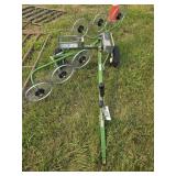 Pull type lawn wheel rake