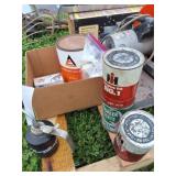 Old oil cans and paint