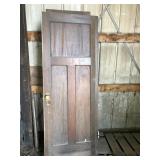 Rustic wood three panel door