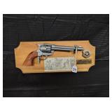 REPLICA WYATT EARP GUN & BADGE ON PLAQUE