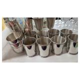 Large selection of pewter cups