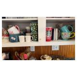 Bottom shelf of cups