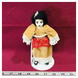 Mangelsen's Porcelain Doll & Stand (Vintage) Mangelsen's Porcelain Doll & Stand (Vintage)