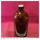 T.G. Bright & Co. Amber Glass Liquor Bottle