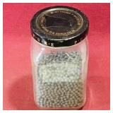 Glass Jar Half-Filled With Shot Pellets
