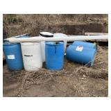 9 +/- 55 Gallon Plastic Barrels