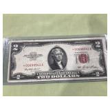 1953 2.00 red seal star note torn corner