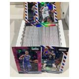 Box of Prizm Basketball cards all colors