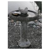 Concrete Bird Bath has repair on Bottom